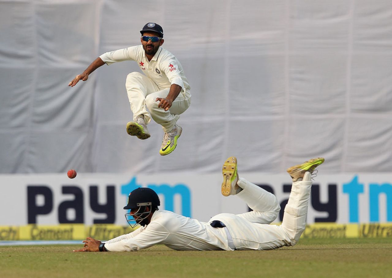 Ajinkya Rahane watches on as the ball lobs agonisingly wide of Cheteshwar Pujara, India v South Africa, 4th Test, Delhi, 4th day, December 6, 2015