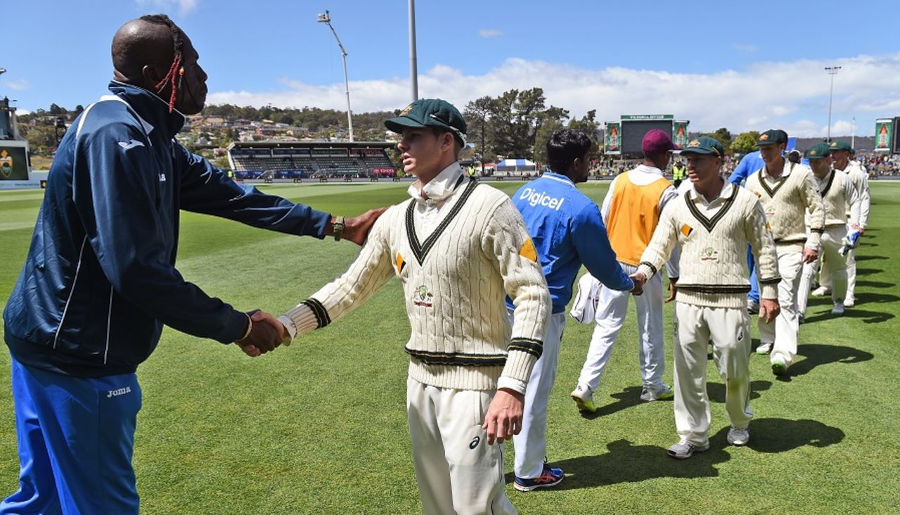 Curtly Ambrose and Steven Smith shake hands after the game, Australia v West Indies, 1st Test, Hobart, 3rd day, December 12, 2015