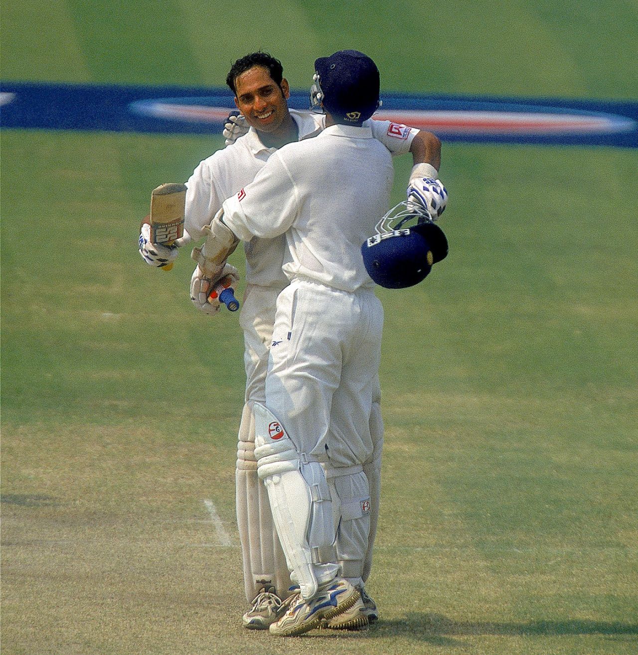 VVS Laxman is hugged by Rahul Dravid after reaching his 200, India v Australia, 2nd Test, Kolkata, 4th day, March 14, 2001