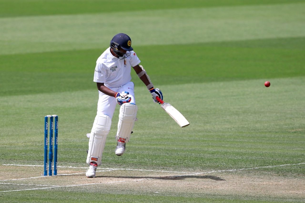 Nuwan Pradeep fends the ball away, New Zealand v Sri Lanka, 2nd Test, Hamilton, 2nd day, December 19, 2015