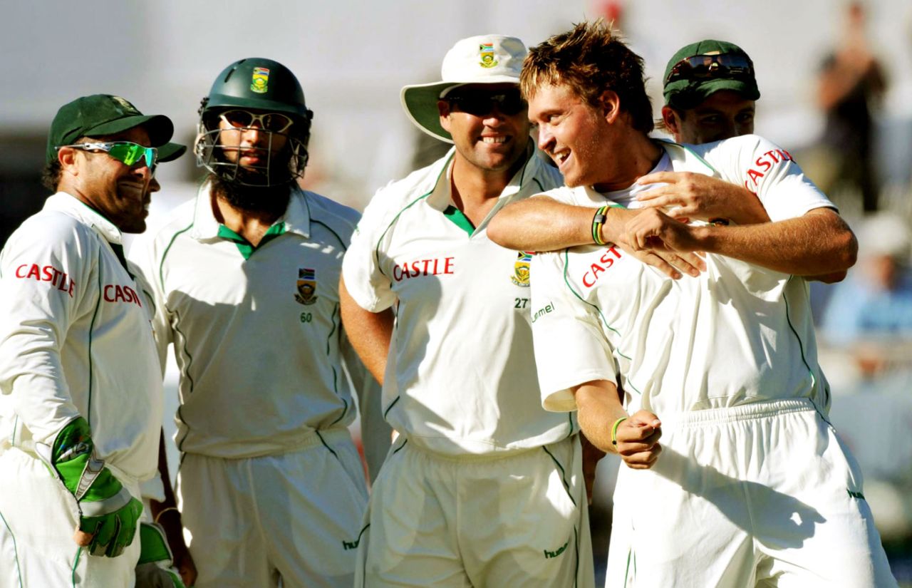 Paul Harris celebrates the wicket of Phil Hughes with his team-mates, South Africa v Australia, 3rd Test, 3rd day, Cape Town, March 21, 2009