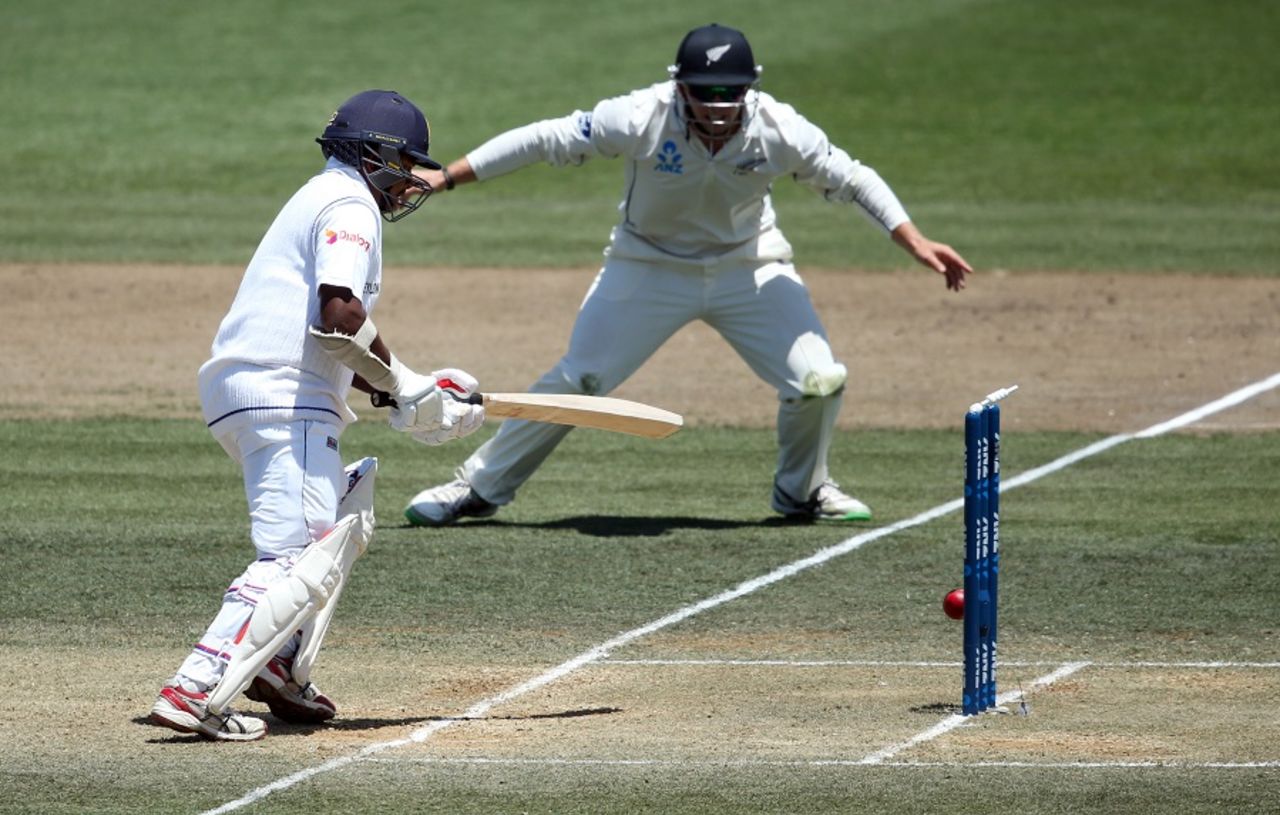 Rangana Herath watches the ball dislodge his leg stump bail, New Zealand v Sri Lanka, 2nd Test, Hamilton, 3rd day, December 20, 2015