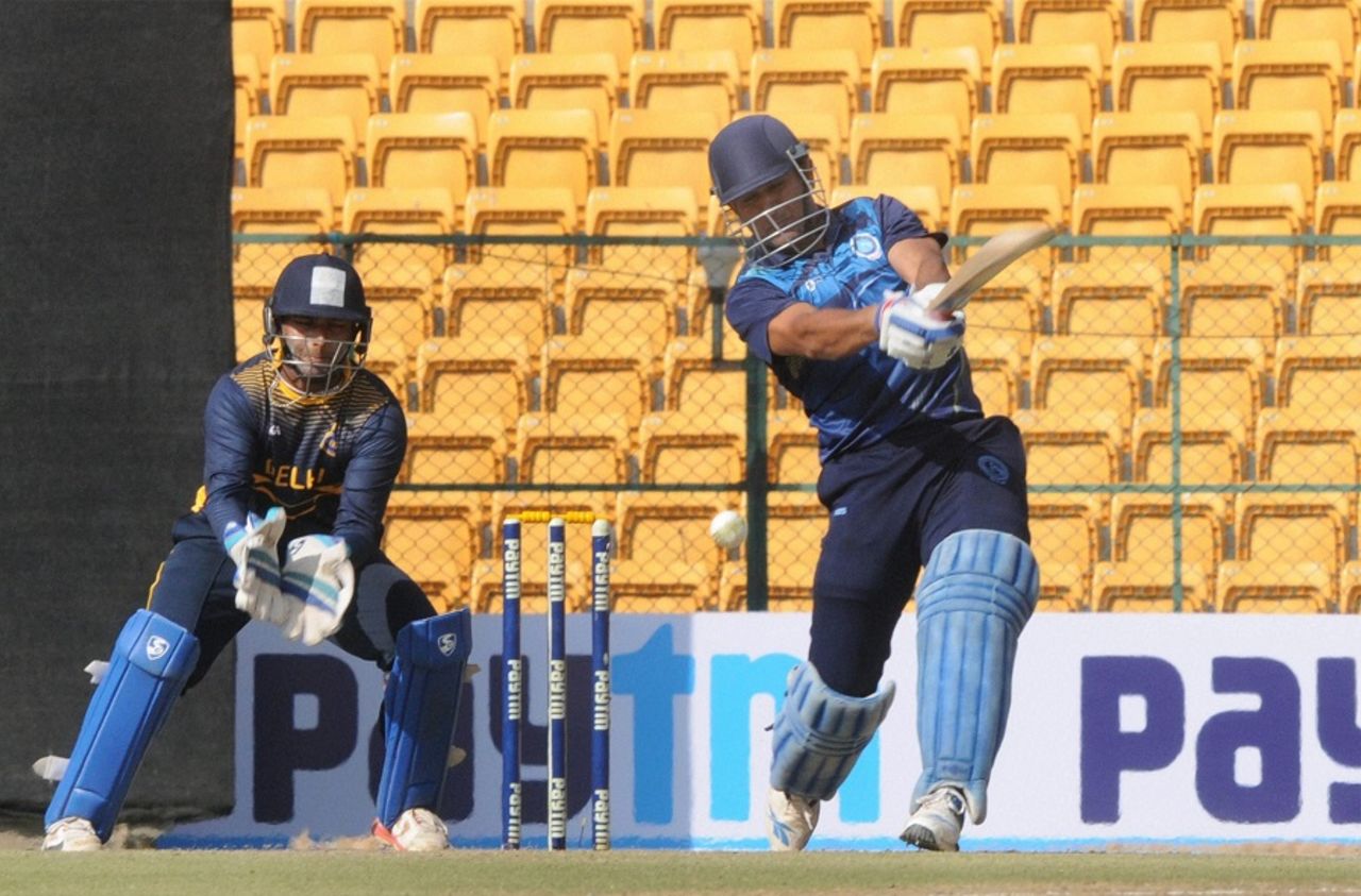 MS Dhoni drills one down the ground during his unbeaten 70, Jharkhand v Delhi, 2nd Quarter-final, Vijay Hazare Trophy, Bangalore