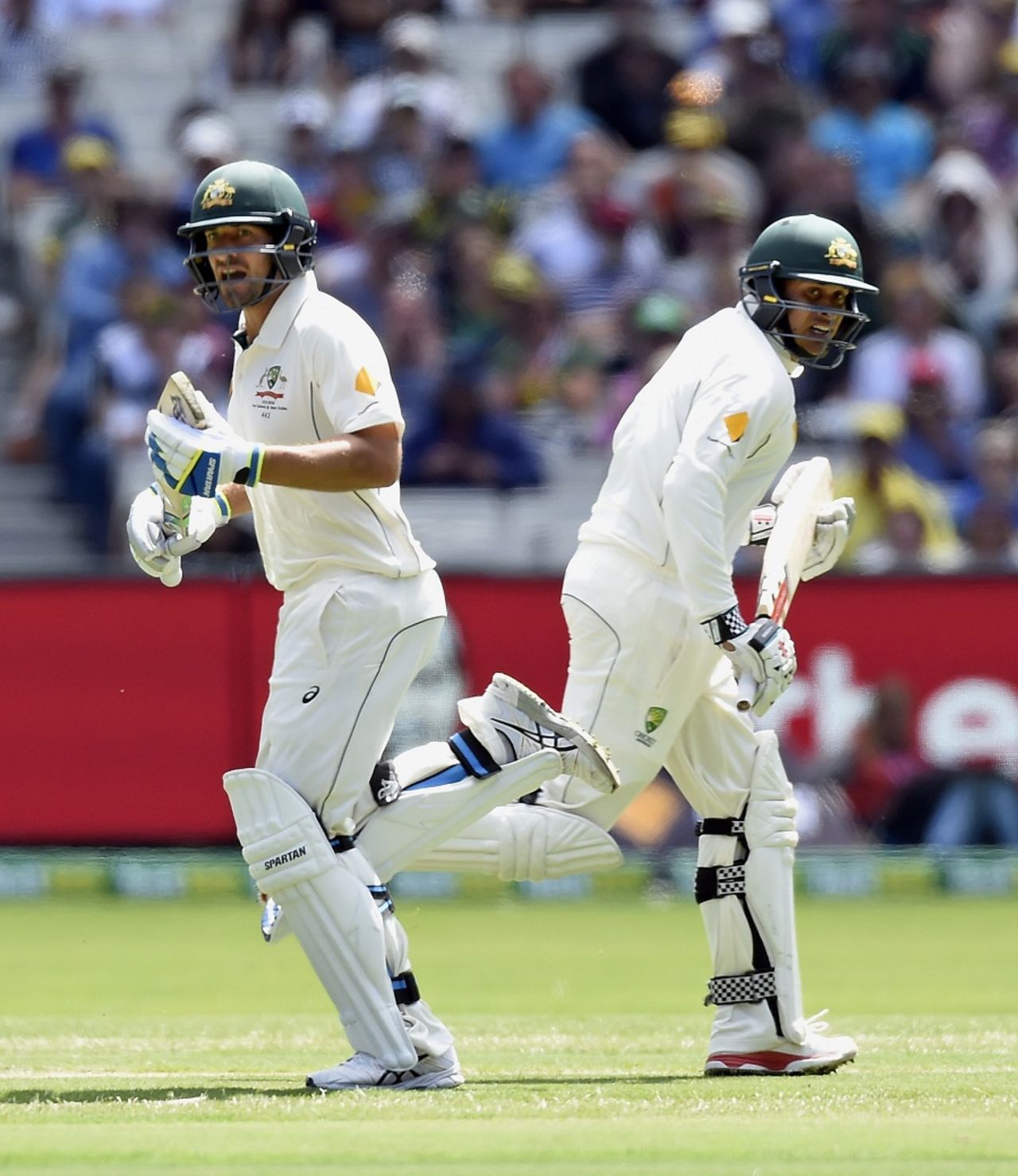 Usman Khawaja and Joe Burns complete a run during their partnership, Australia v West Indies, 2nd Test, 1st day, Melbourne, December 26, 2015