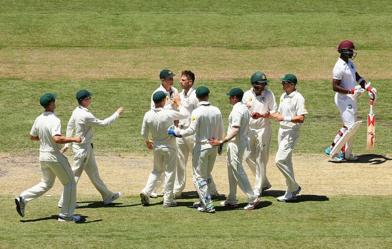 Australia celebrate the wicket of Kemar Roach, Australia v West Indies, 2nd Test, Melbourne, 3rd day, December 28, 2015
