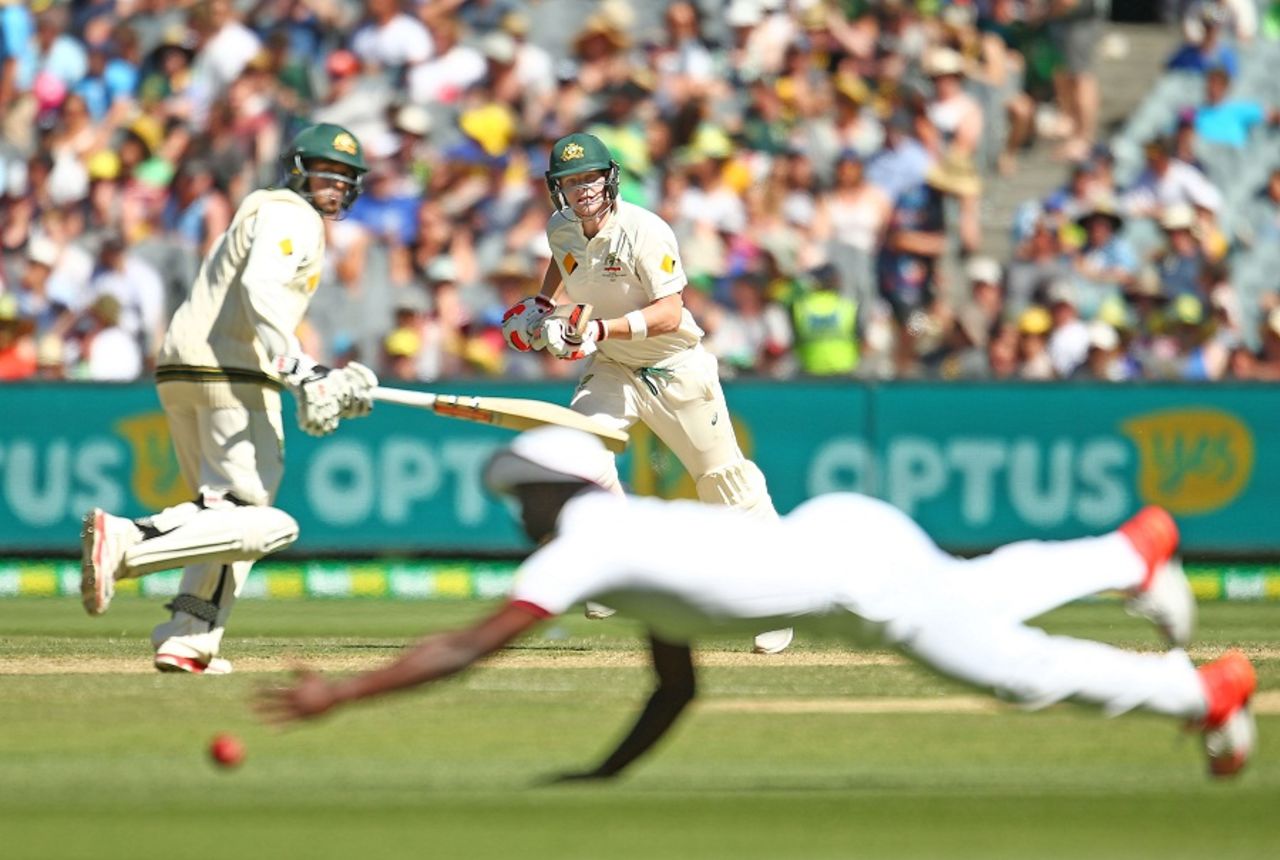 Steven Smith and Usman Khawaja complete a run during their 77-run stand, Australia v West Indies, 2nd Test, Melbourne, 3rd day, December 28, 2015
