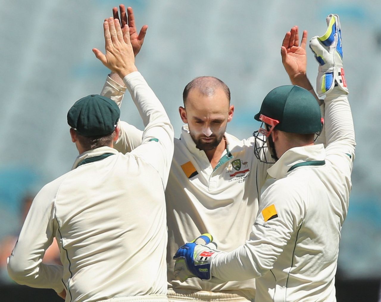 Nathan Lyon celebrates a wicket with his team-mates, Australia v West Indies, 2nd Test, Melbourne, 4th day, December 29, 2015