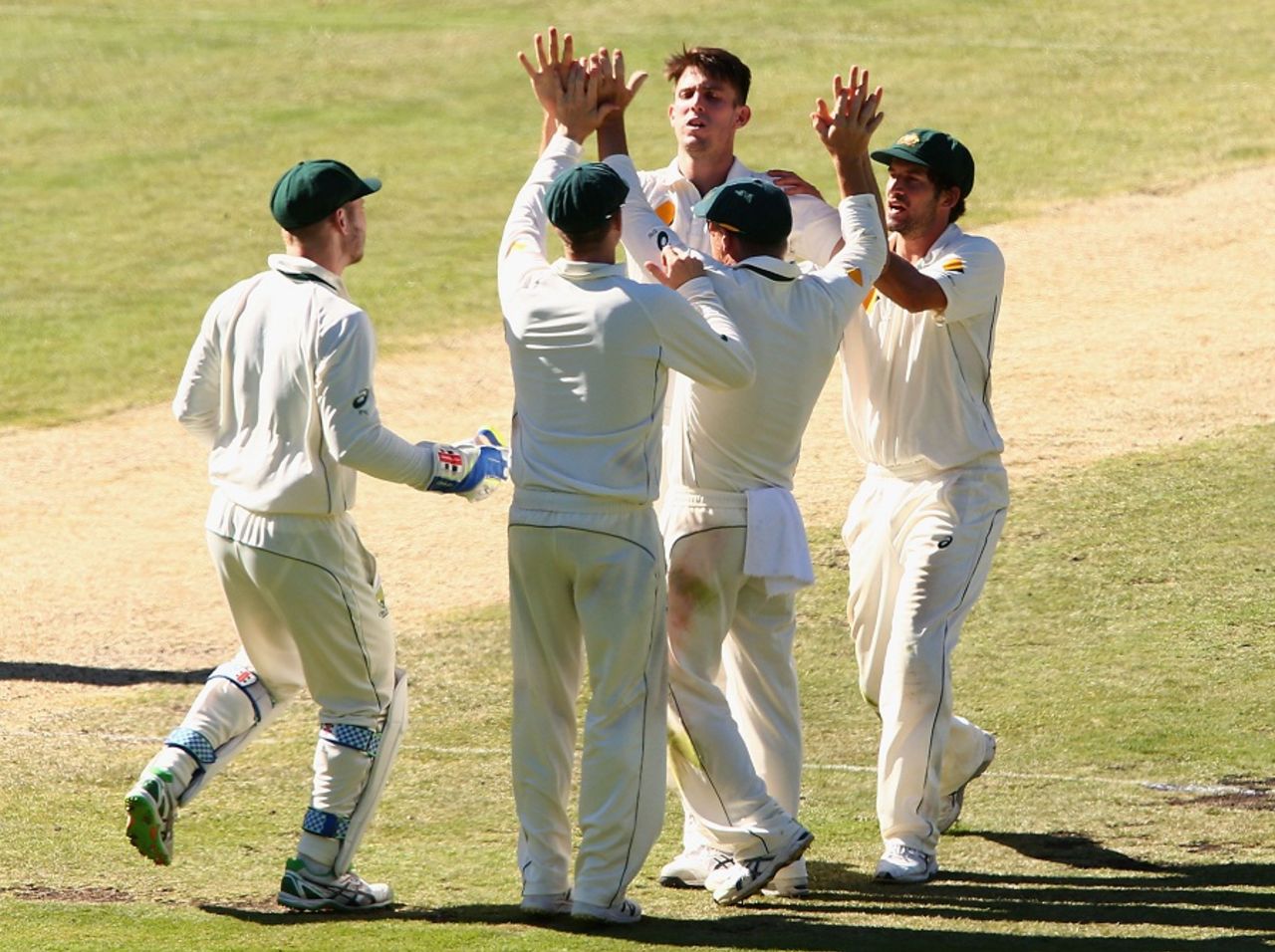 Mitchell Marsh celebrates a wicket with his team-mates, Australia v West Indies, 2nd Test, Melbourne, 4th day, December 29, 2015