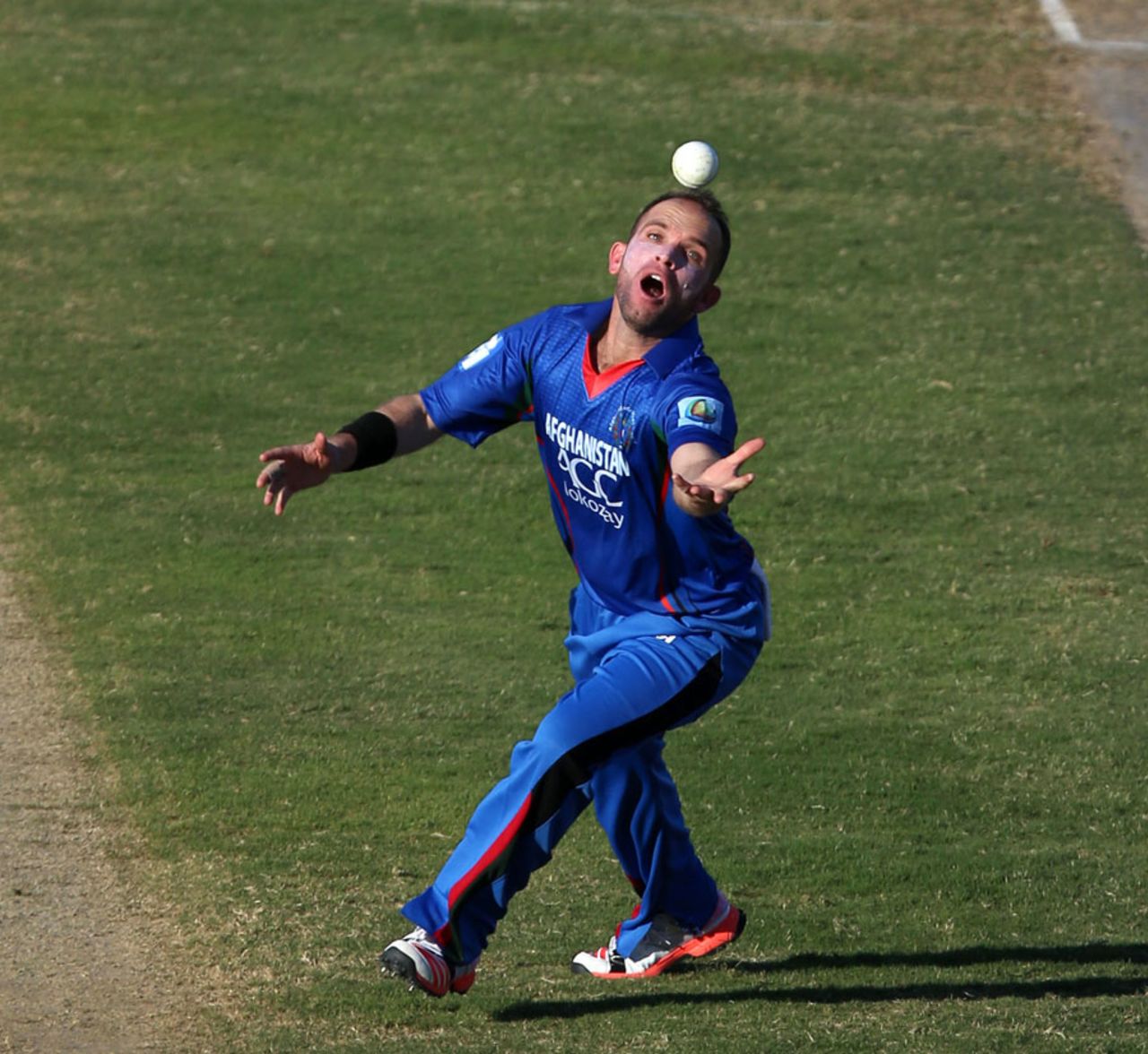 Debutant Rokhan Barakzai holds on to a catch, Afghanistan v Zimbabwe, 2nd ODI, Sharjah, December 29, 2015