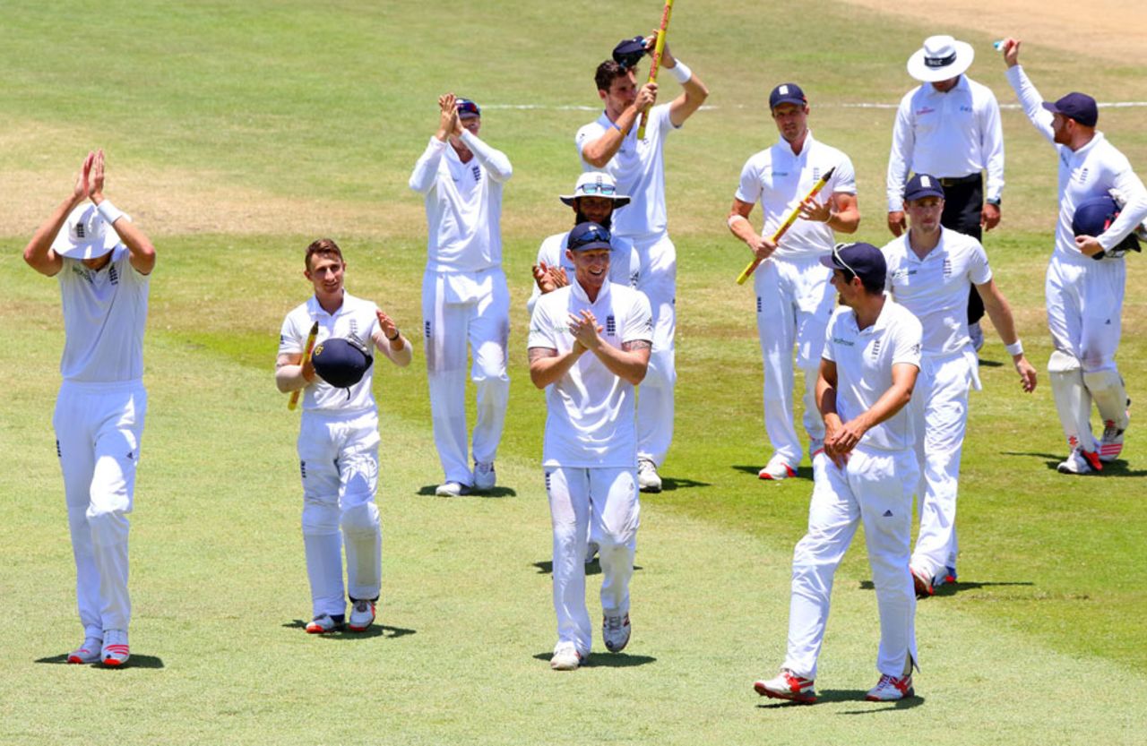 The England players celebrate their 241-run win, South Africa v England, 1st Test, Durban, 5th day, December 30, 2015