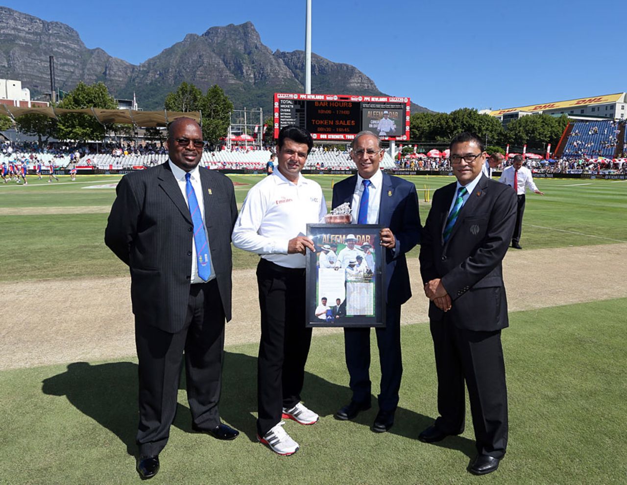 Aleem Dar was presented with a memento of his 100th Test, South Africa v England, 2nd Test, Cape Town, 1st day, January 2, 2016