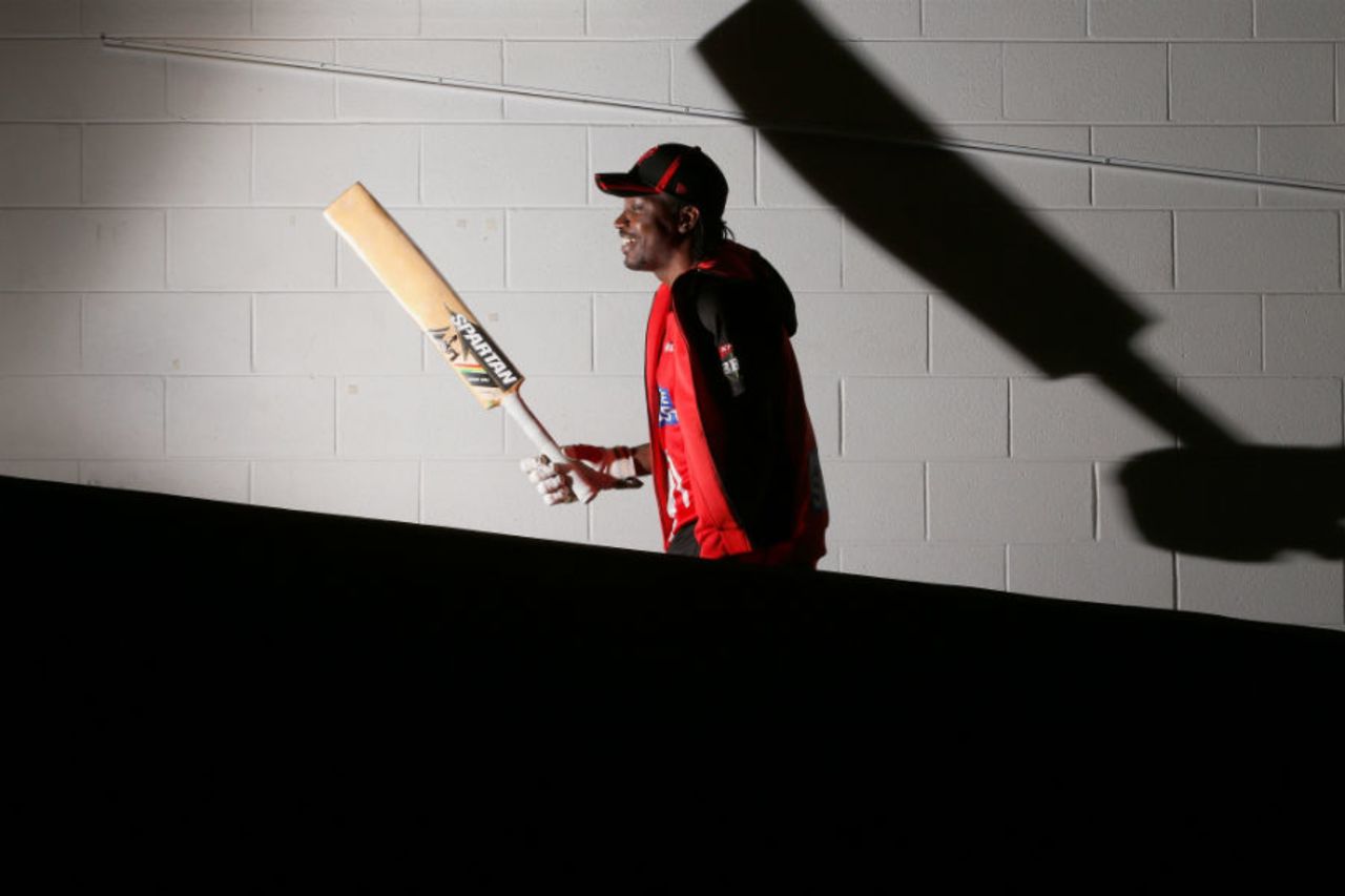 Chris Gayle and big bat, photographed at the MCG, Melbourne Renegades v Melbourne Stars, January 2, 2016