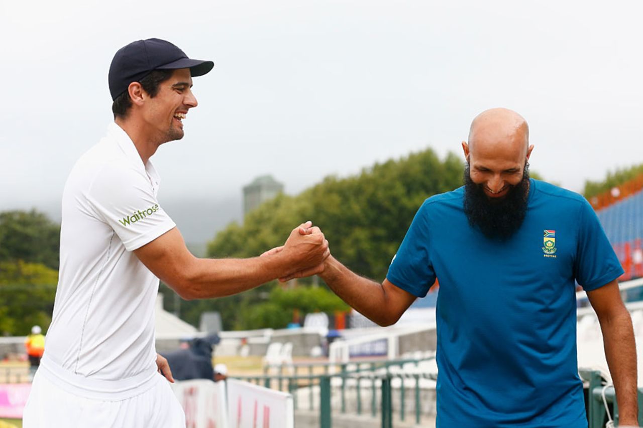 Alastair Cook and Hashim Amla share a smile, South Africa v England, 2nd Test, Cape Town, 5th day, January 6, 2016