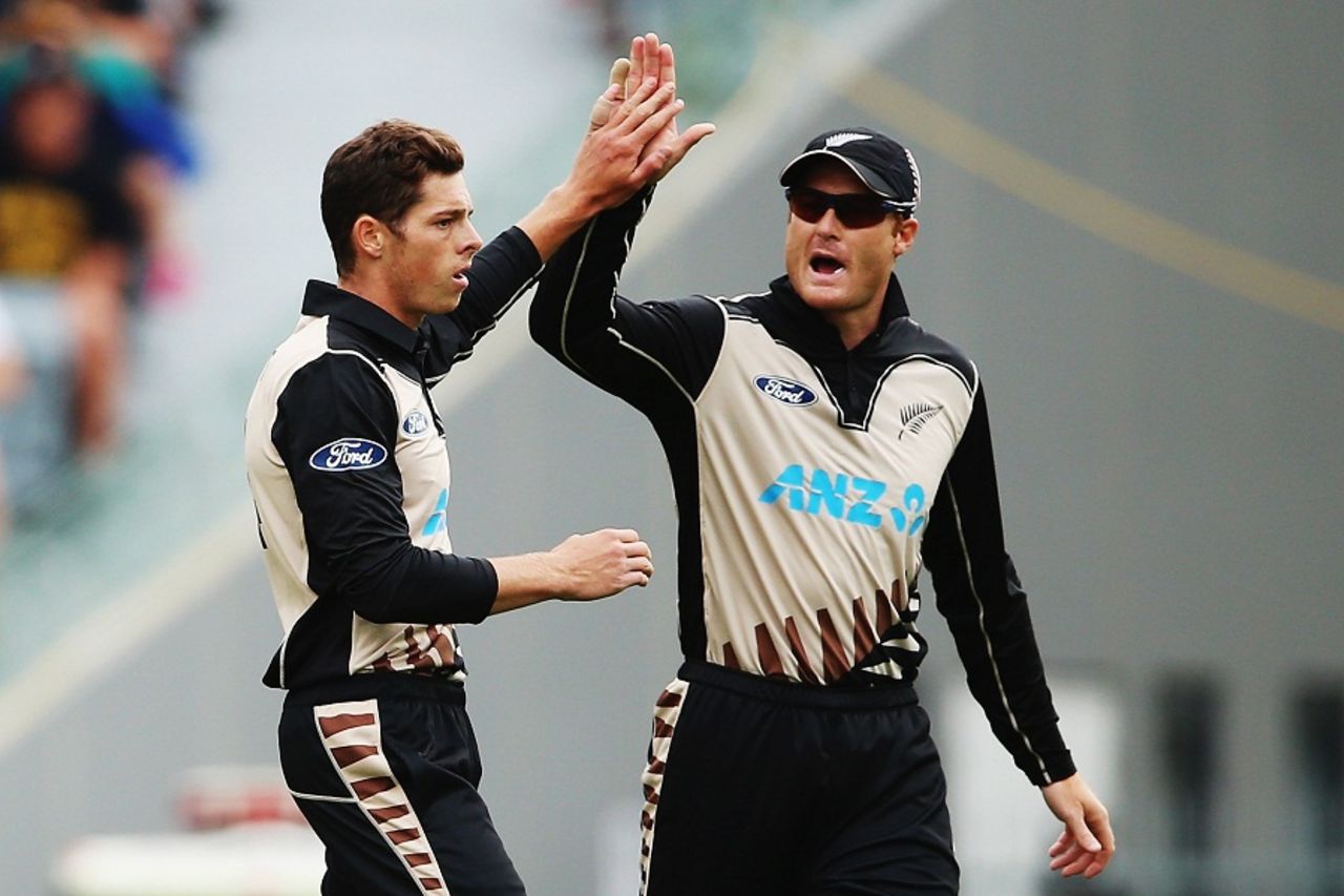 Mitchell Santner and Martin Guptill celebrate Dinesh Chandimal's wicket, New Zealand v Sri Lanka, 2nd T20I, Auckland, January 10, 2016