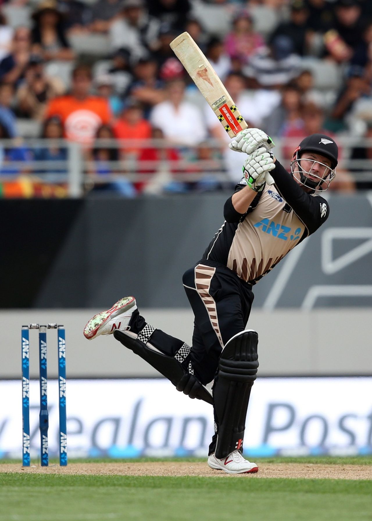 Colin Munro lofts the ball through the leg side during his fifty , New Zealand v Sri Lanka, 2nd T20I, Auckland, January 10, 2016
