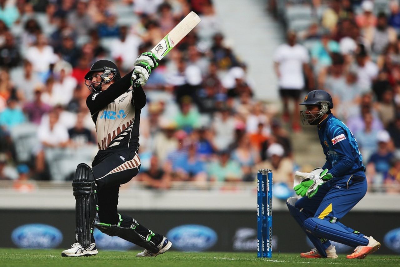 Martin Guptill sends one down the ground during his 25-ball 63, New Zealand v Sri Lanka, 2nd T20I, Auckland, January 10, 2016