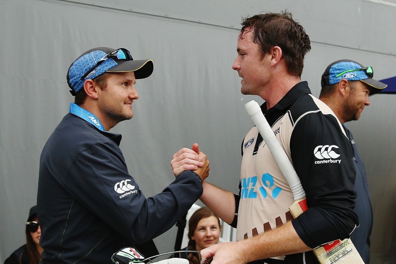 Colin Munro is greeted by New Zealand coach Mike Hesson after he smashed a 14-ball 50, New Zealand v Sri Lanka, 2nd T20I, Auckland, January 10, 2016