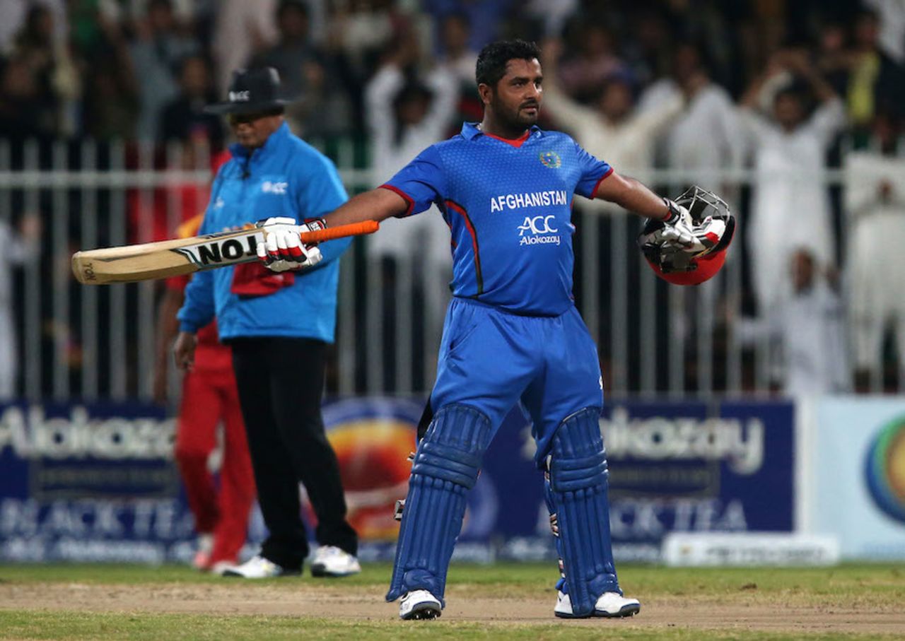Mohammad Shahzad celebrates his century in his trademark style, Afghanistan v Zimbabwe, 2nd T20I, Sharjah, January 10, 2016