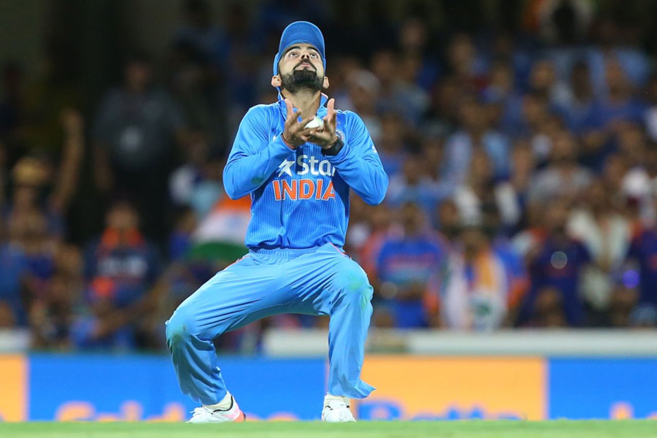 Virat Kohli settles under the catch of Shaun Marsh, Australia v India, 2nd ODI, Brisbane, January 15, 2016