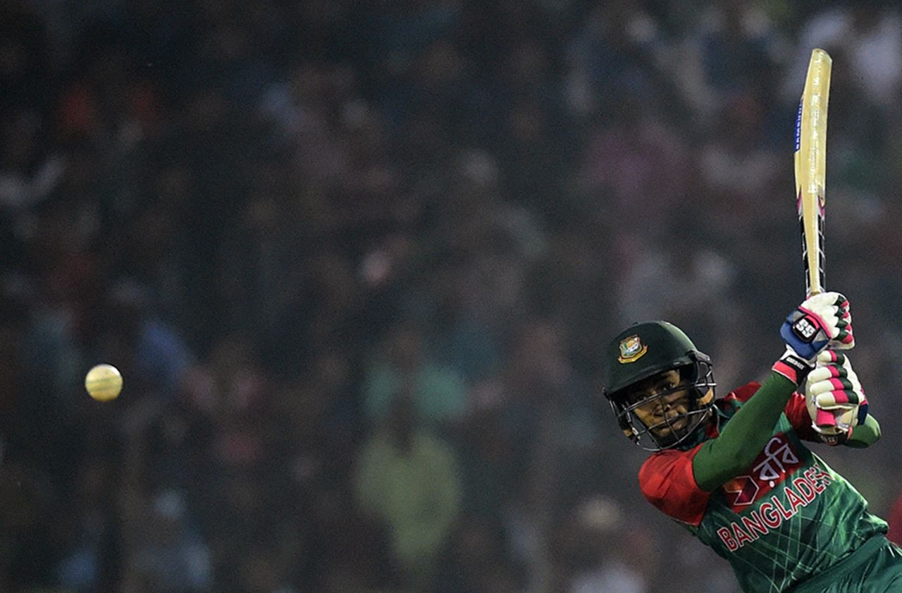 Mushfiqur Rahim lofts the ball through the off side, Bangladesh v Zimbabwe, 1st T20I, Khulna, January 15, 2016