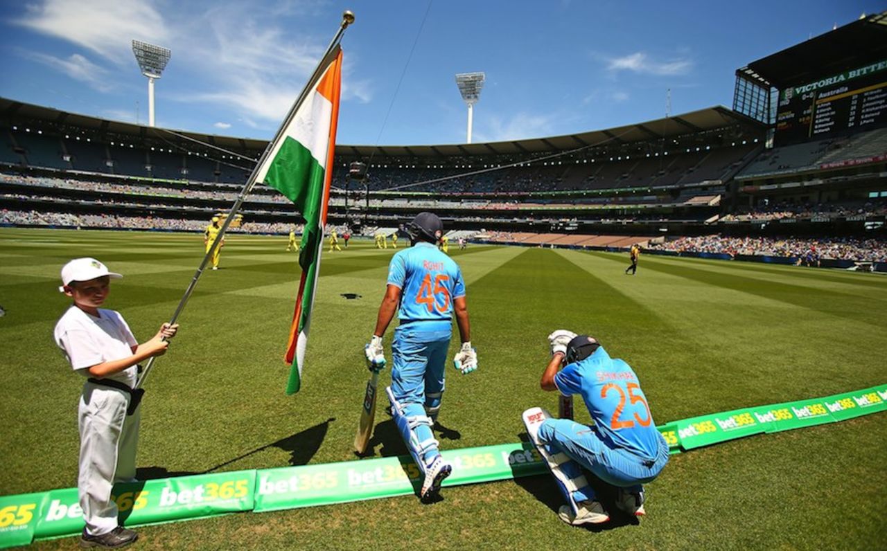 Rohit Sharma and Shikhar Dhawan walk out to bat at the MCG, Australia v India, 3rd ODI, Melbourne, January 17, 2016