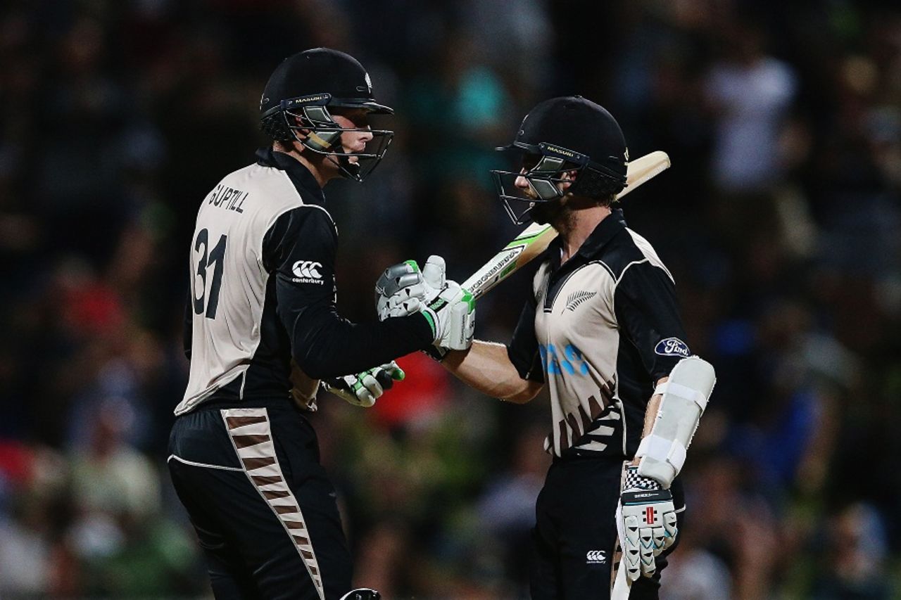 Martin Gutpill and Kane Williamson shake hands during their rapid stand, New Zealand v Pakistan, 2nd T20I, Hamilton, January 17, 2016