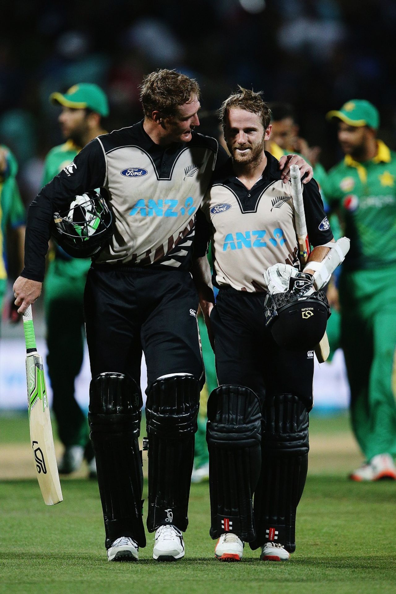 Martin Guptill and Kane Williamson walk off after securing a ten-wicket win,  New Zealand v Pakistan, 2nd T20I, Hamilton, January 17, 2016