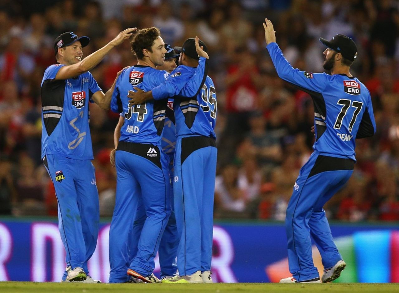 Travis Head celebrates a wicket his with team-mates, Melbourne Renegades v Adelaide Strikers, BBL 2015-16, Melbourne, January 18, 2016