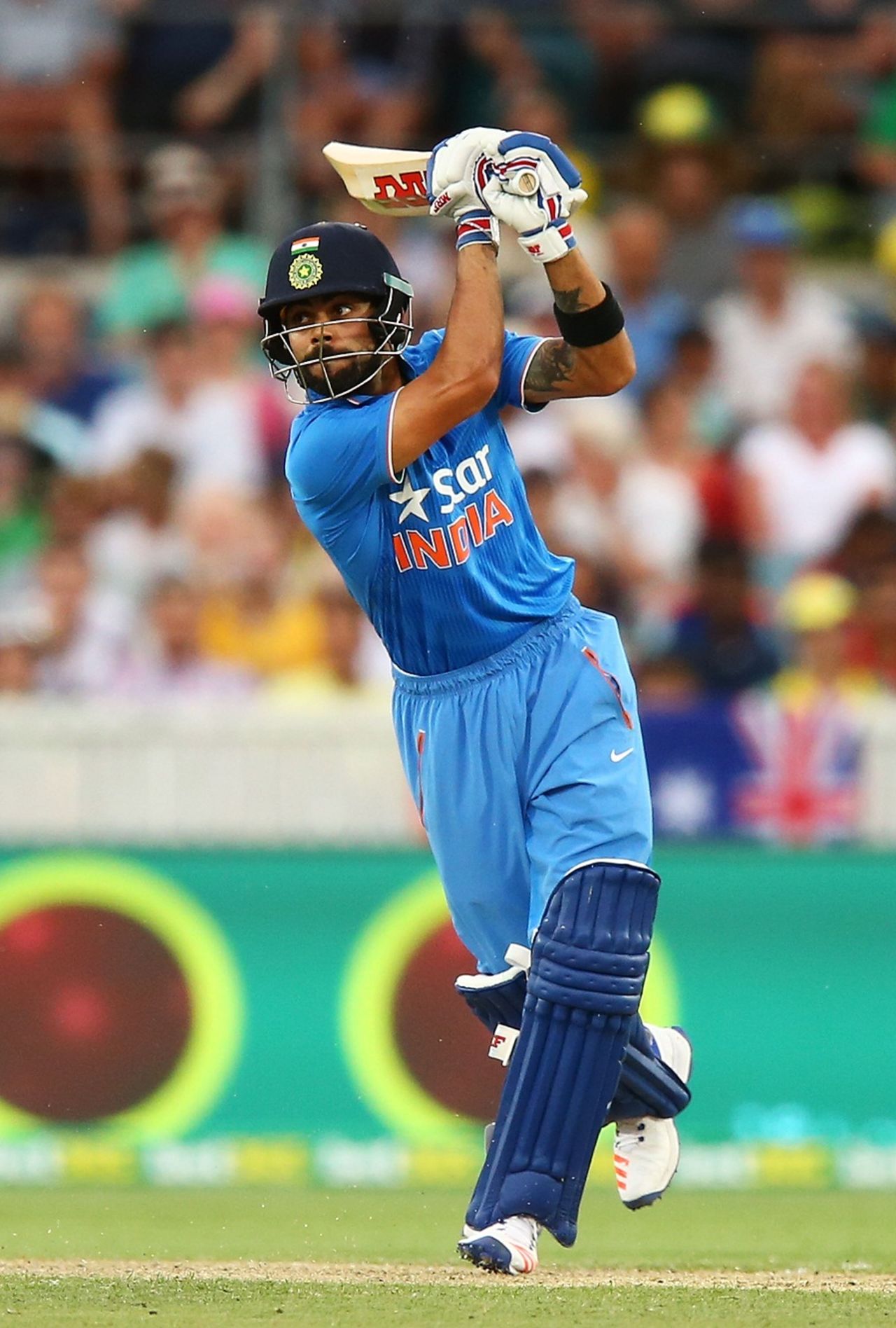 Virat Kohli drives through the off side, Australia v India, 4th ODI, Canberra, January 20, 2016