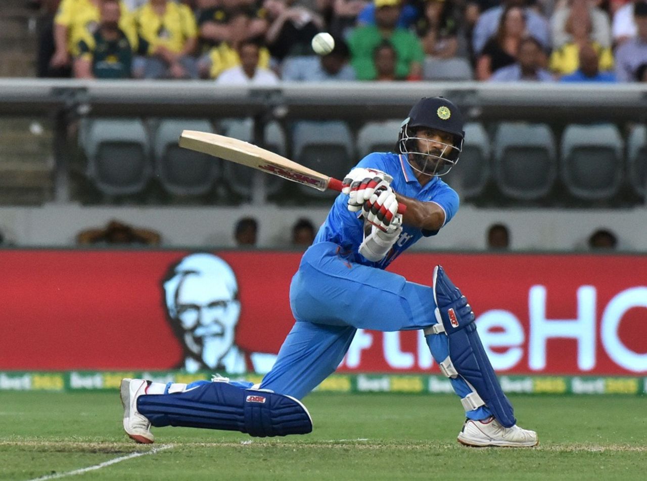 Shikhar Dhawan plays a sweep, Australia v India, 4th ODI, Canberra, January 20, 2016