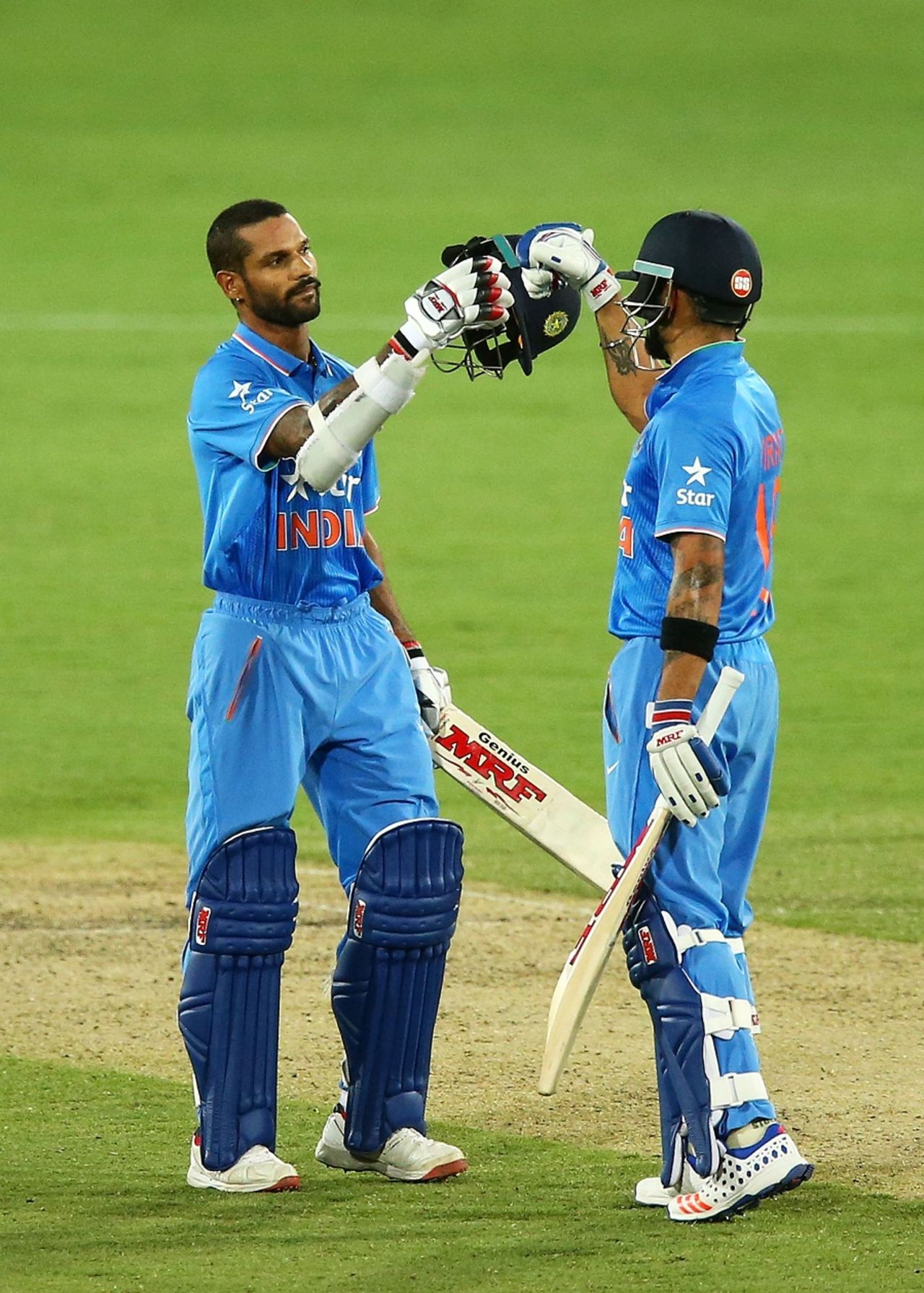Virat Kohli and Shikhar Dhawan celebrate the latter's ton, Australia v India, 4th ODI, Canberra, January 20, 2016