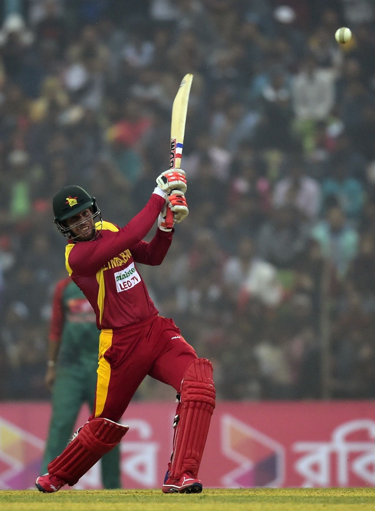 Malcolm Waller belts one through the covers, Bangladesh v Zimbabwe, 3rd T20, Khulna, January 20, 2016