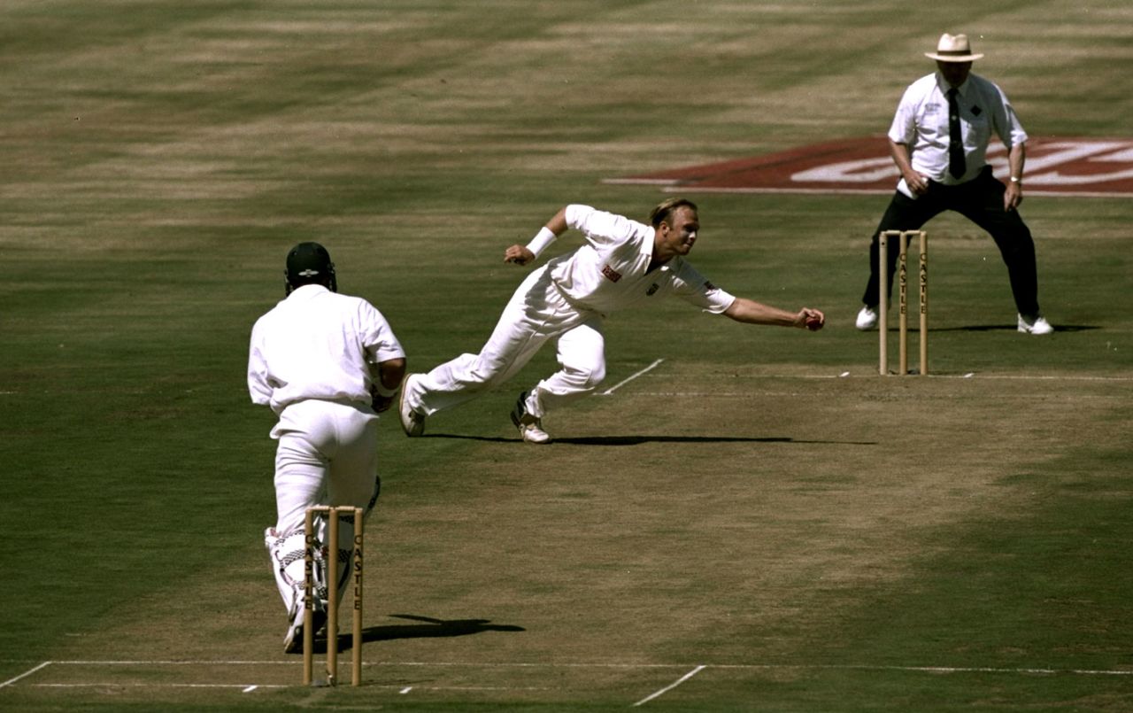 Brett Schultz fields the ball off his own bowling, South Africa v Australia, 3rd Test, Centurion, March 1997 