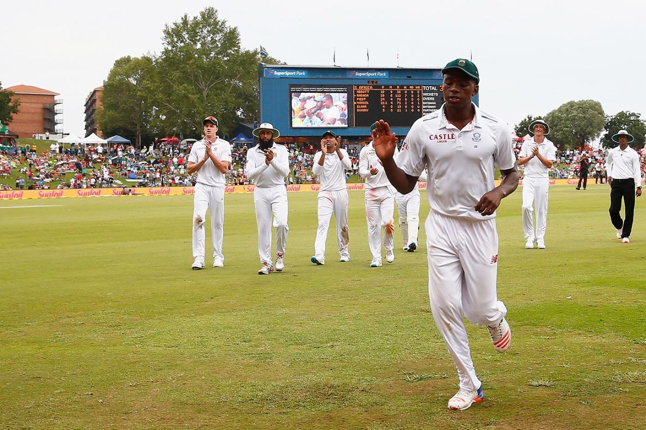 Kagiso Rabada leads South Africa from the field after returning career-best figures of 7 for 112, South Africa v England, 4th Test, Centurion, 3rd day, January 24, 2016