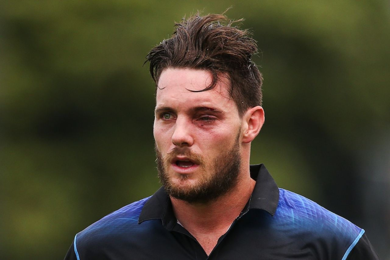 Mitchell McClenaghan walks off the field with a bruised eye after getting hit by a short ball, New Zealand v Pakistan, 1st ODI, Basin Reserve, Wellington, January 25, 2016