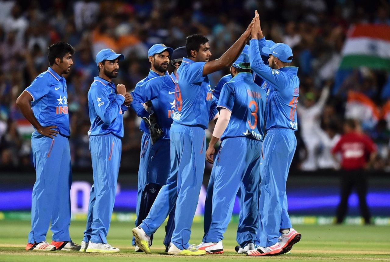 R Ashwin is mobbed by his team-mates, Australia v India, 1st T20 international, Adelaide, January 26, 2016