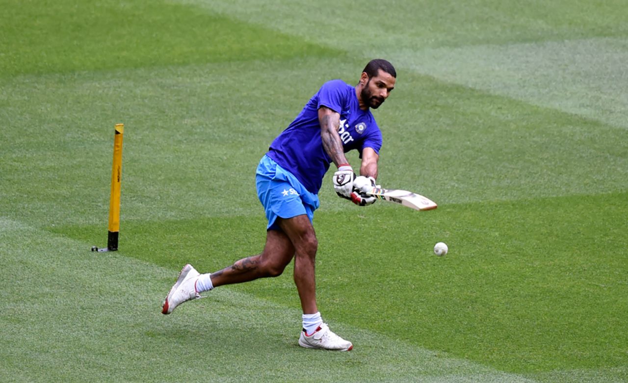 Shikhar Dhawan has a bat during a training session, Melbourne, January 28, 2016