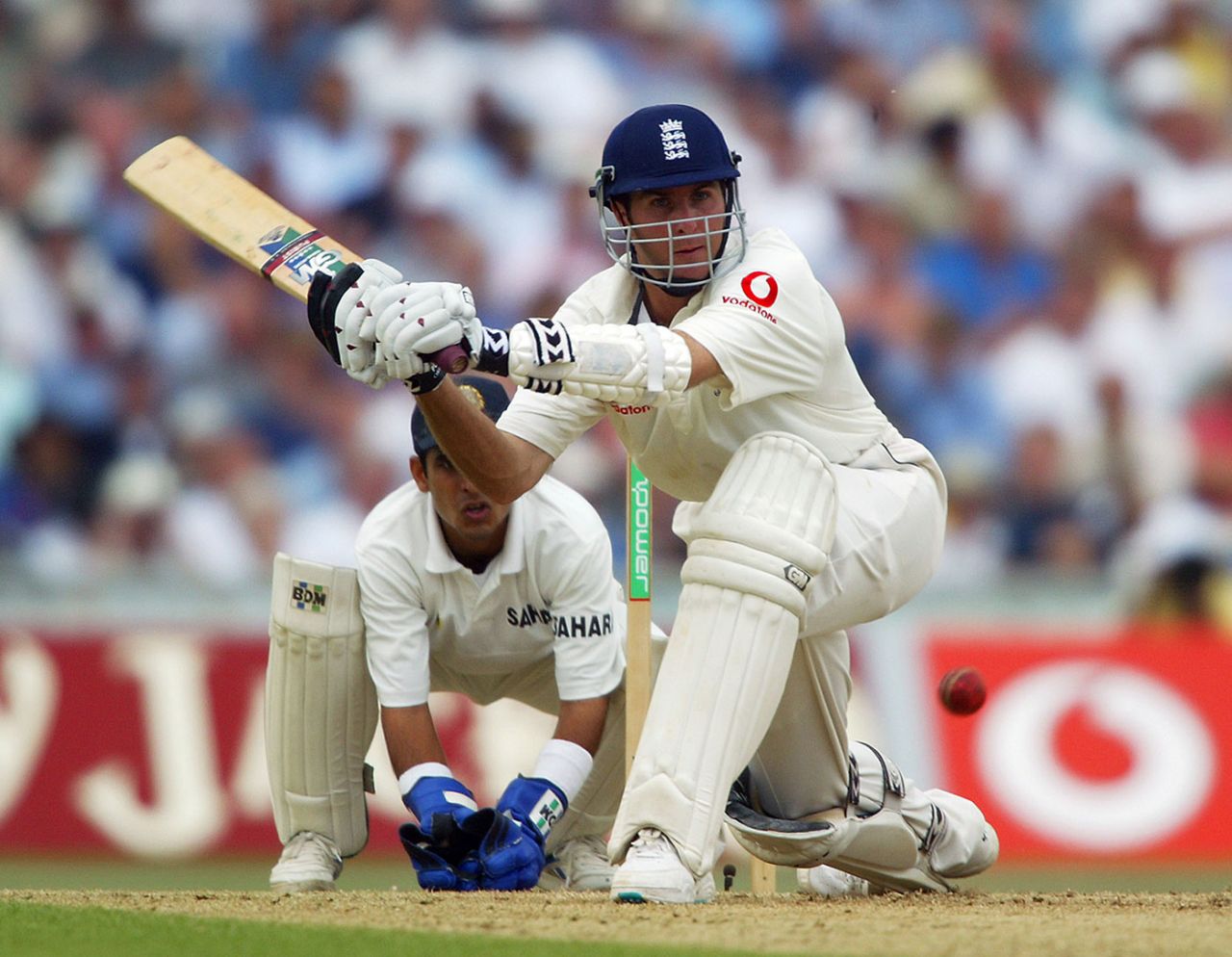 Michael Vaughan prepares to sweep, England v India, 4th Test, The Oval, 1st day, September 5, 2002