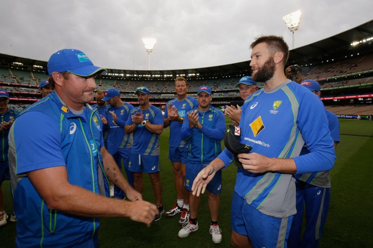 Andrew Tye receives his Australia cap from Ryan Harris, Australia v India, 2nd T20I, Melbourne, January 29, 2016