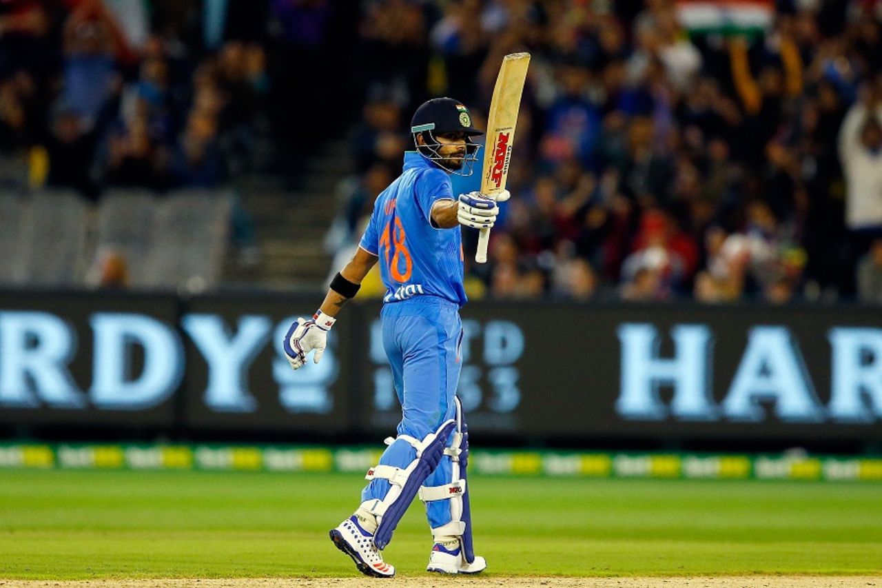 Virat Kohli raises his bat after reaching his fifty, Australia v India, 2nd T20I, Melbourne, January 29, 2016