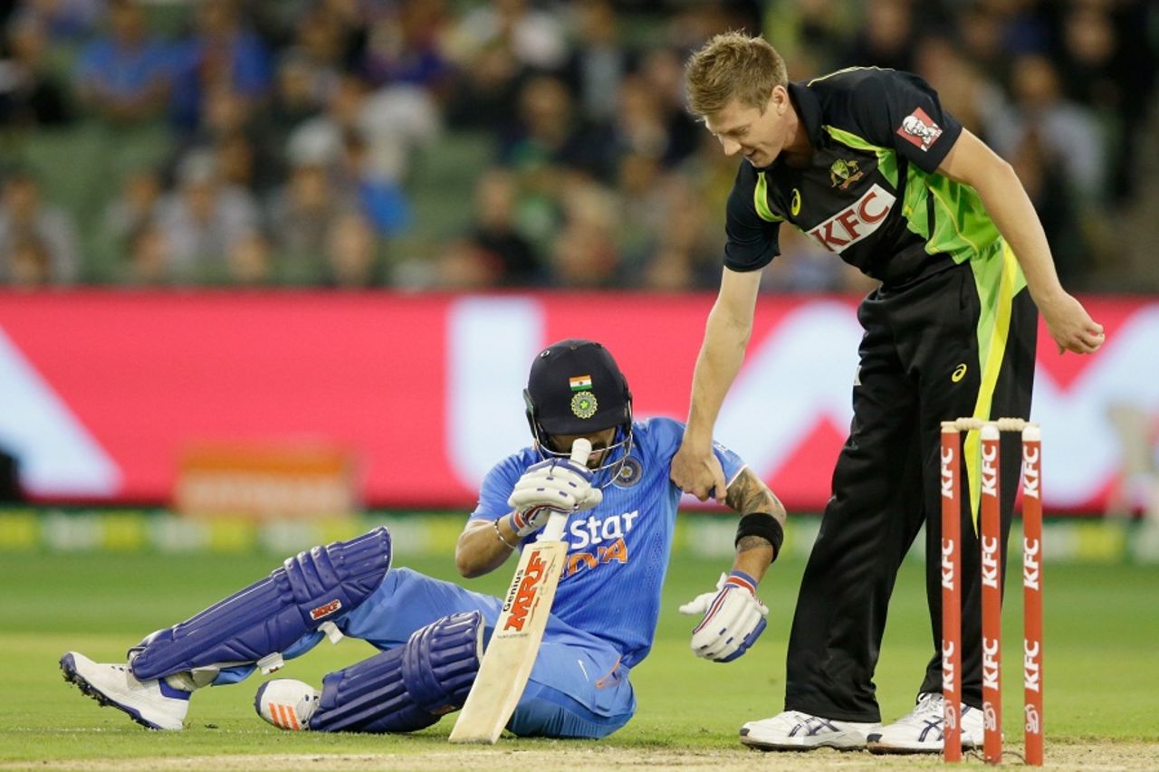 James Faulkner helps Virat Kohli get back on his feet, Australia v India, 2nd T20I, Melbourne, January 29, 2016