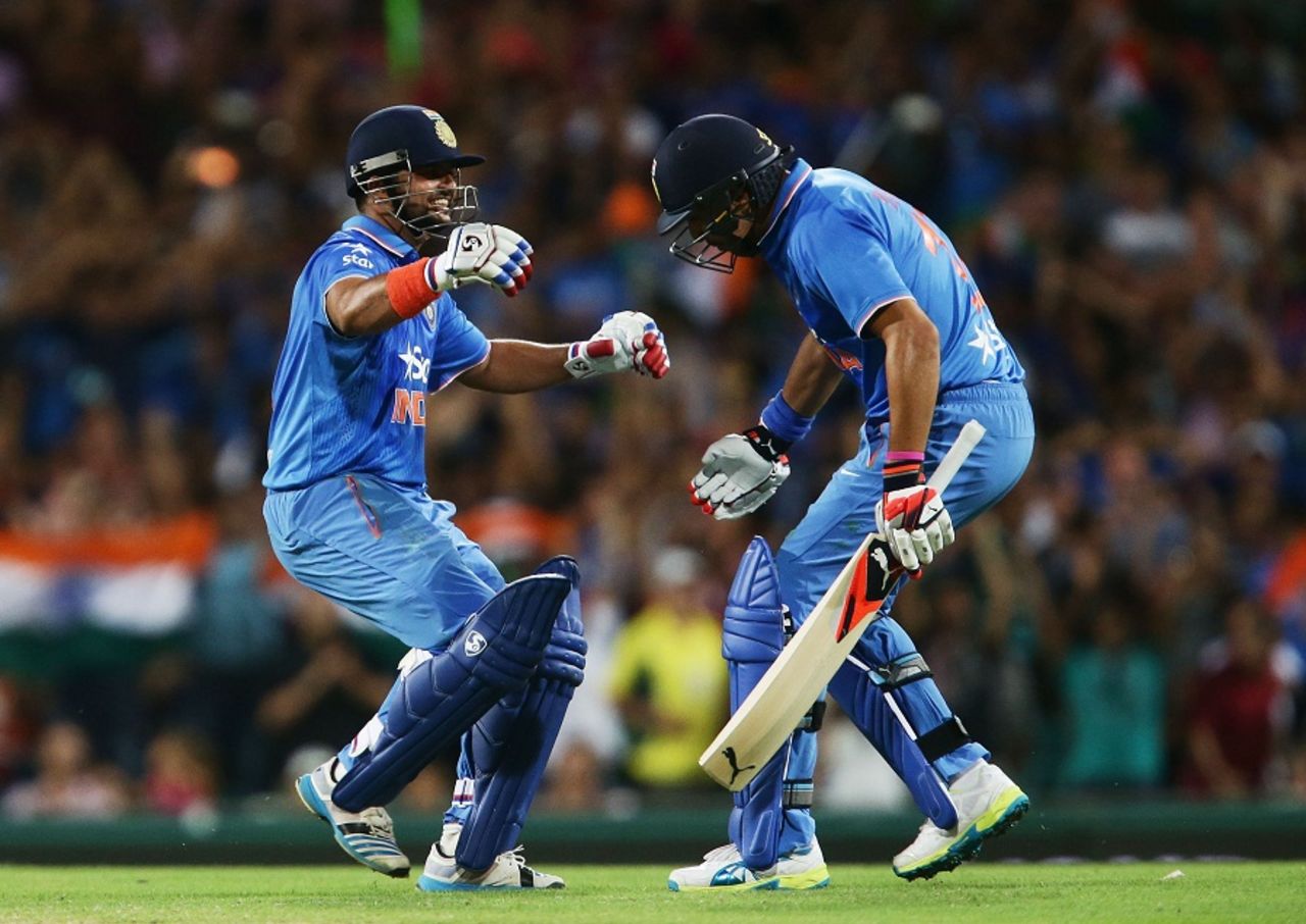 Suresh Raina celebrates India's win with Yuvraj Singh, Australia v India, 3rd T20I, Sydney, January 31, 2016