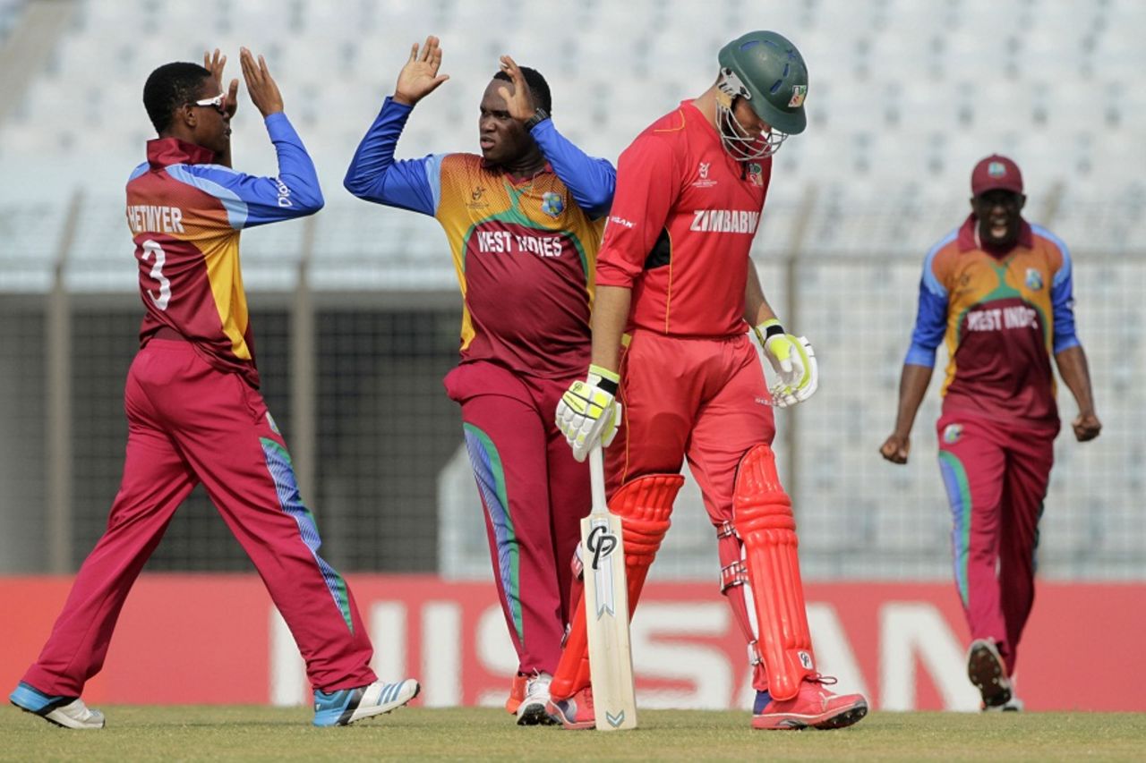 Gidron Pope celebrates a wicket with captain Shimron Hetmyer, West Indies v Zimbabwe, Under-19 World Cup, Chittagong, February 2, 2016
