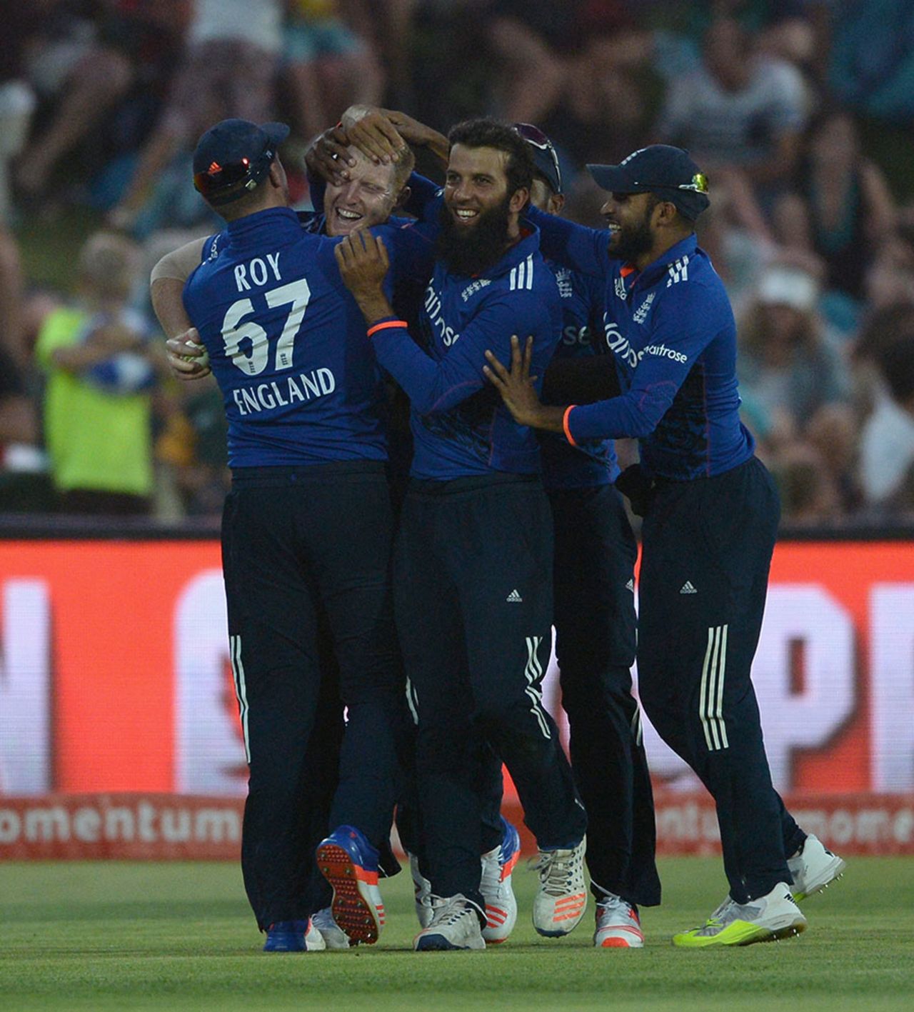 Ben Stokes is mobbed by his team-mates after a stunning catch to dismiss AB de Villiers, South Africa v England, 1st ODI, Bloemfontein, February 3, 2016