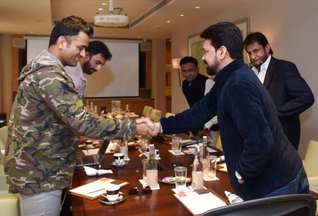 MS Dhoni and Anurag Thakur shake hands  at the World T20 and Asia Cup selection meeting, New Delhi, February 5, 2016