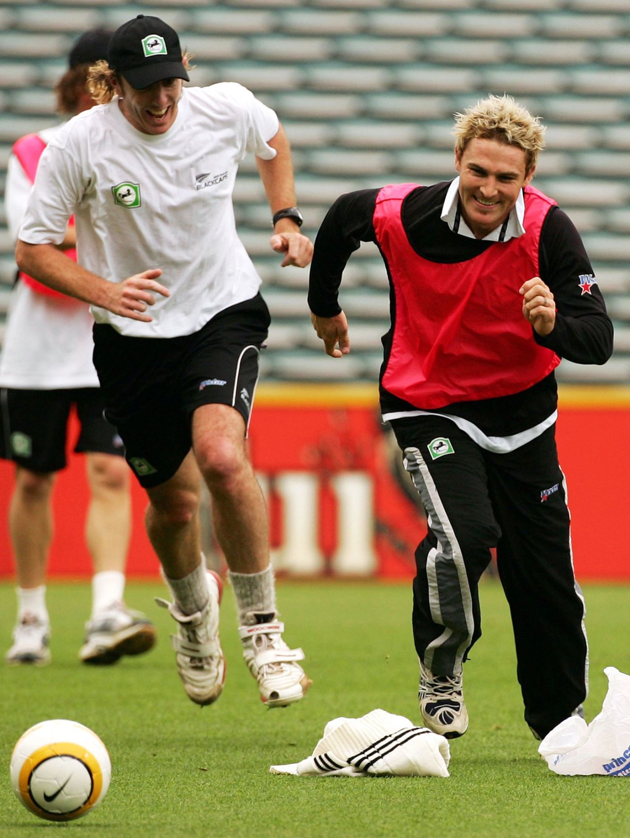 Iain O'Brien and Brendon McCullum play football during practice, Auckland, March 24, 2005
