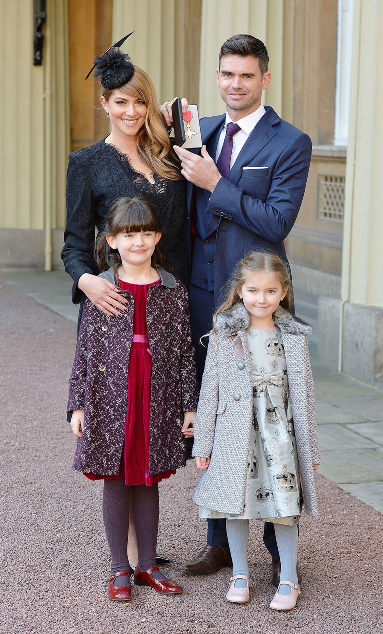 James Anderson at Buckingham Palace, with wife Danielle, and daughters Lola and Ruby, after receiving his OBE, London, February 11, 2016