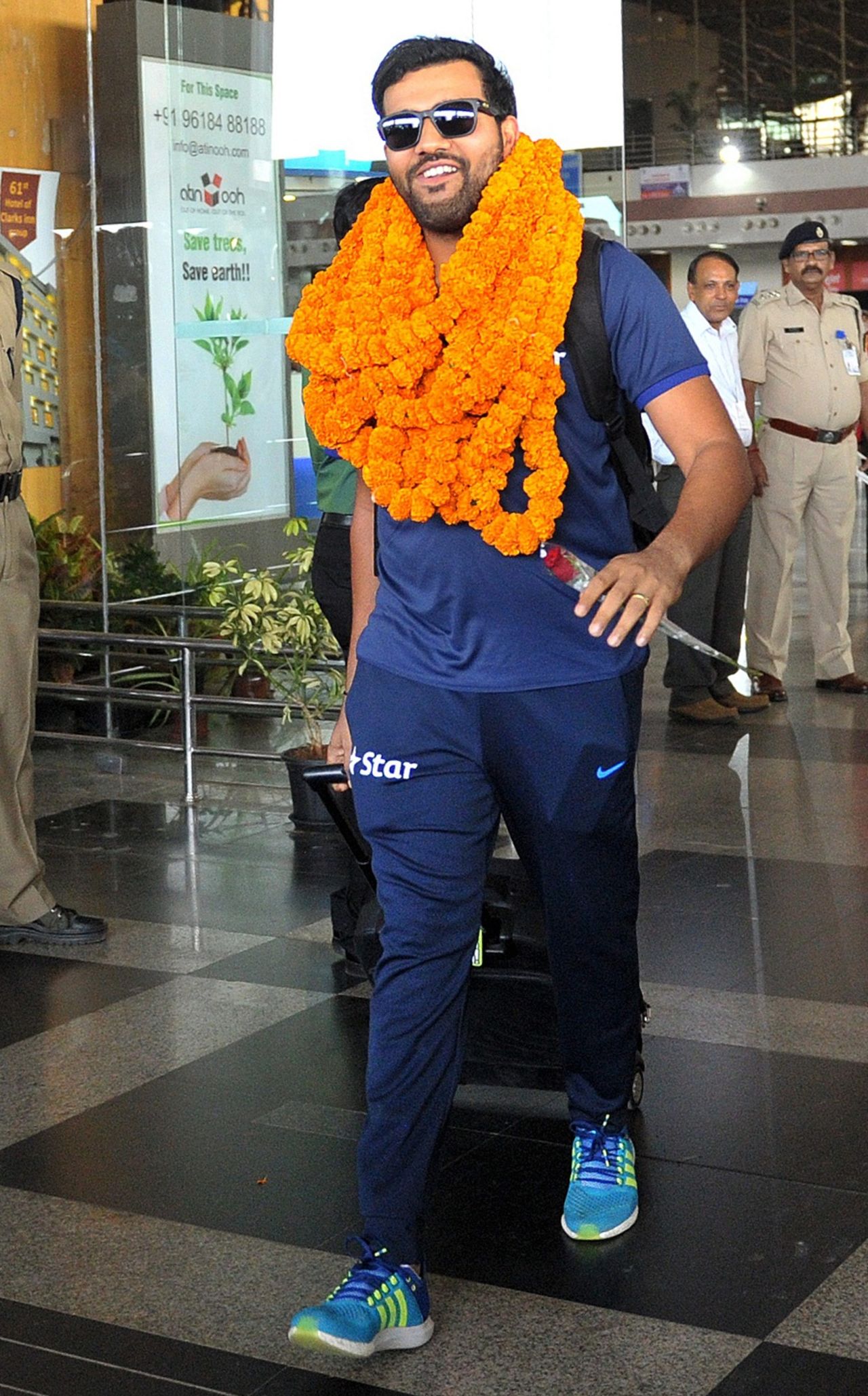 Rohit Sharma was welcomed with a bunch of garlands at the Visakhapatnam airport, Visakhapatnam, February 13, 2016