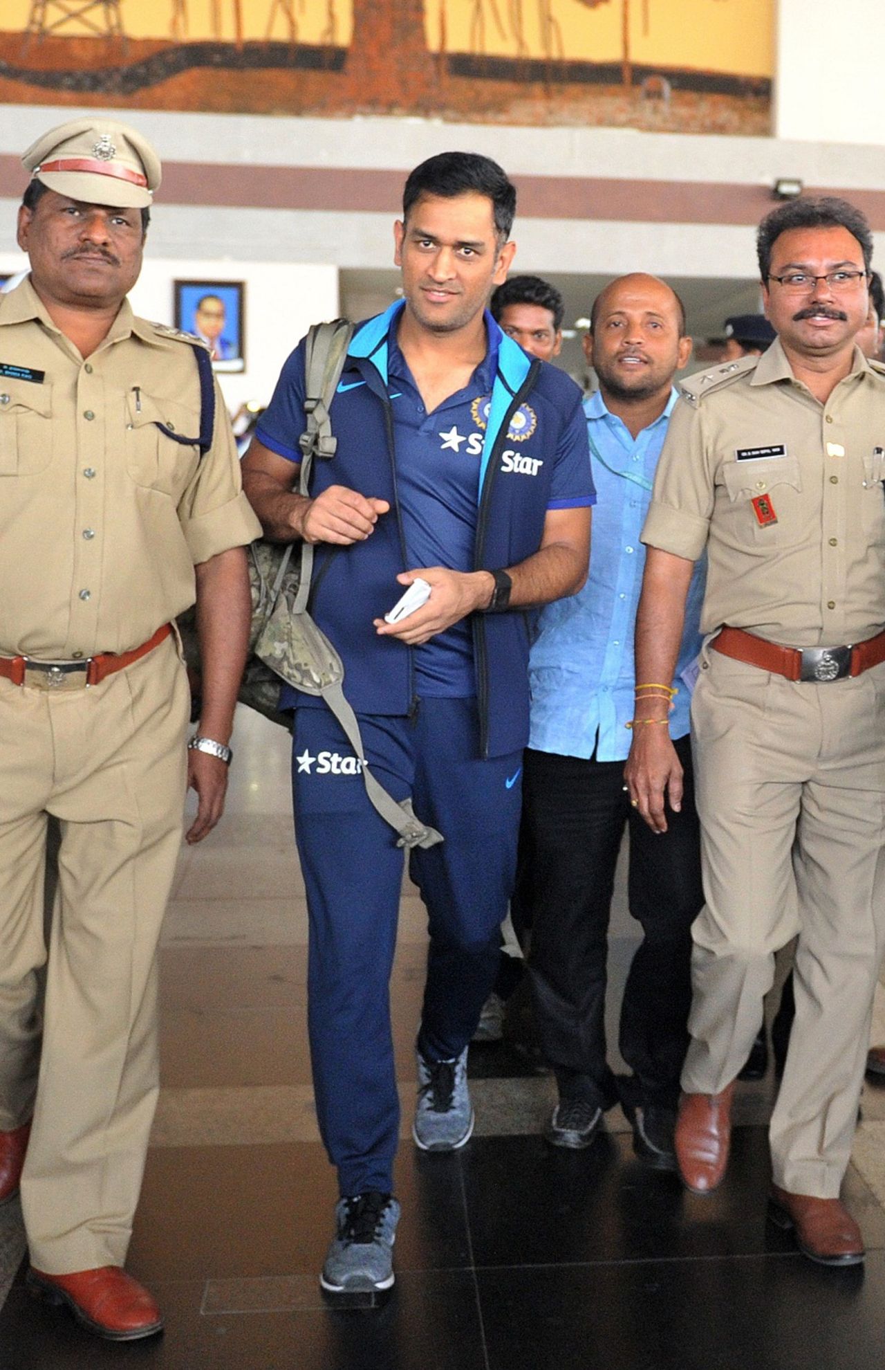 Amid heavy security, MS Dhoni makes his way out of Visakhapatnam airport, Visakhapatnam, February 13, 2016