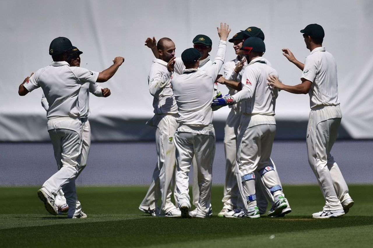 Nathan Lyon celebrates Martin Guptill's wicket with his team-mates, New Zealand v Australia, 1st Test, Wellington, 3rd day, February 14, 2016